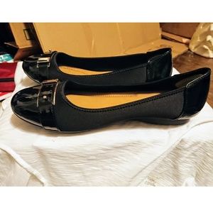 Black buckle flats